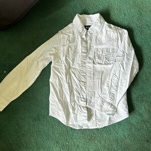 Boys solid white button down shirt. Never been worn.